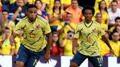 Luis Muriel y Juan Cuadrado durante un partido con Selecci&oacute;n Colombia.