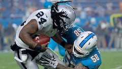 MIAMI GARDENS, FL - NOVEMBER 05: Marshawn Lynch #24 of the Oakland Raiders is tackled by Rey Maualuga #58 of the Miami Dolphins during a game at Hard Rock Stadium on November 5, 2017 in Miami Gardens, Florida.   Mike Ehrmann/Getty Images/AFP
 == FOR NEWSPAPERS, INTERNET, TELCOS &amp; TELEVISION USE ONLY ==