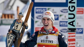 Austria's Daniel Tschofenig celebrates after winning the second leg of the Four Hills Ski Jumping tournament (Vierschanzentournee), in Garmisch-Partenkirchen, southern Germany, on January 1, 2025. (Photo by KERSTIN JOENSSON / AFP)