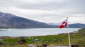 FILE PHOTO: Greenland's flag flies in Igaliku settlement, Greenland, July 5, 2024. Ritzau Scanpix/Ida Marie Odgaard via REUTERS/File Photo ATTENTION EDITORS - THIS IMAGE WAS PROVIDED BY A THIRD PARTY. DENMARK OUT. NO COMMERCIAL OR EDITORIAL SALES IN DENMARK./File Photo
