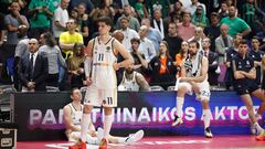Real Madrid players react after the final Men's Euroleague Final Four basketball match between Real Madrid and Panathinaikos in Berlin, Germany on May 26, 2024.