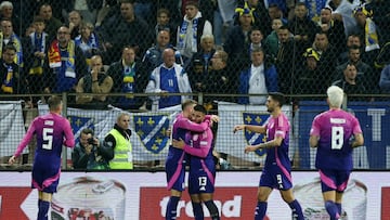 Soccer Football - UEFA Nations League - Group A3 - Bosnia and Herzegovina v Germany - Bilino Polje Stadium, Zenica, Bosnia and Herzegovina - October 11, 2024 Germany's Deniz Undav celebrates scoring their goal with teammates