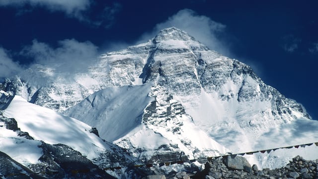Mount Everest faces rising deaths, trash, and Sherpa exploitation as Nepal enacts reforms to curb over-tourism by reducing fees on other peaks.