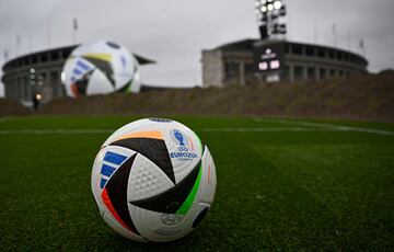 The official ball is pictured on November 15, 2023 in front of the Olympic Stadium in Berlin, Germany, during an event organised by sports equipment maker Adidas to present the official ball for the 2024 UEFA European Football Championship. (Photo by Tobias SCHWARZ / AFP)