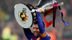 Barcelona&#039;s Lionel Messi celebrates winning La Liga with the trophy   