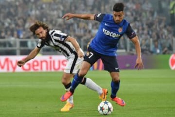 Andrea Pirlo y Nabil Dirar