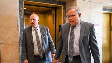 Britt Reid, left, walks to a courtroom with his attorney J.R. Hobbs, right, on Tuesday at the Jackson County Courthouse to be sentenced for a drunk driving conviction. The former assistant coach and son of head coach Andy Reid in September pleaded guilty to driving while intoxicated and causing a 2021 crash that severely injured a 5-year-old girl. (Tammy Ljungblad/The Kansas City Star/Tribune News Service via Getty Images)