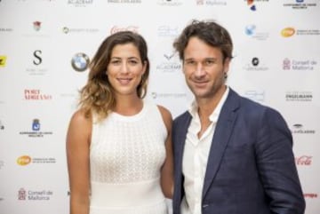 Garbiñe Muguruza y Carlos Moyà. 