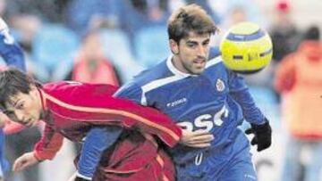<b>EMPATE. </b>Celta y Getafe igualaron en un choque en el que el Getafe, como Paunovic en la imagen, no pudo con el empuje del Celta.