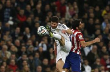Xabi Alonso y Raúl García.