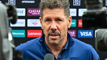 Atletico Madrid's Argentine coach Diego Simeone speaks to the press at the mixed zone before a training session at Los Angeles Memorial Coliseum in Los Angeles on June 14, 2025 on the eve of the Club World Cup 2025 football match between Paris Saint-Germain and Atletico Madrid. (Photo by Frederic J. Brown / AFP)