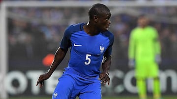 France's midfielder N'Golo Kante drives the ball during the friendly football match between France and Scotland, at the St Symphorien Stadium in Longeville-lès-Metz, Eastern France, on June 4, 2016. / AFP PHOTO / FRANCK FIFE