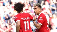 Soccer Football - Premier League - Liverpool v Aston Villa - Anfield, Liverpool, Britain - May 20, 2023 Liverpool's Roberto Firmino celebrates scoring their first goal with Mohamed Salah REUTERS/Phil Noble EDITORIAL USE ONLY. No use with unauthorized audio, video, data, fixture lists, club/league logos or 'live' services. Online in-match use limited to 75 images, no video emulation. No use in betting, games or single club /league/player publications.  Please contact your account representative for further details.