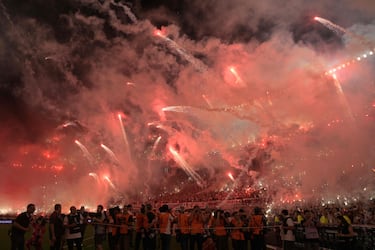 Fireworks explode before the Copa Libertadores semi-final second leg football match between Argentina's River Plate and Brazil's Atletico Mineiro at the Mas Monumental stadium in Buenos Aires on October 29, 2024. (Photo by JUAN MABROMATA / AFP)