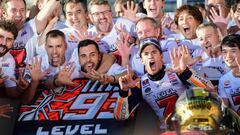 Repsol Honda Team Spanish rider Marc Marquez celebrates in the pits of the MotoGP Japanese Grand Prix at Twin Ring Motegi circuit in Motegi, Tochigi prefecture on October 21, 2018. - Honda&#039;s Marc Marquez stormed to victory in a nail-biting Japan race on October 21 to capture his third straight MotoGP world title. (Photo by Martin BUREAU / AFP)