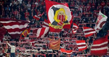 Soccer Football - Champions League - Bayern Munich vs Celtic - Allianz Arena, Munich, Germany - October 18, 2017 Bayern Munich fans hold up scarves and wave flags REUTERS/Michael Dalder