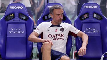 Paris Saint-Germain's coach Luis Enrique reacts from the bench before the friendly football match between France's Paris Saint-Germain and Japan's Cerezo Osaka at Nagai Stadium in Osaka on July 28, 2023. (Photo by PAUL MILLER / AFP)