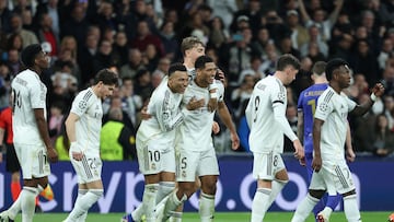 Real Madrid's English midfielder #05 Jude Bellingham (C) celebrates scoring his team's sixth goal with Real Madrid's French forward #10 Kylian Mbappe during the UEFA Champions League league phase day 7 football match between Real Madrid CF and AS Monaco at Santiago Bernabeu Stadium in Madrid on January 20, 2026. (Photo by Thomas COEX / AFP)