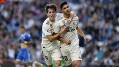 Asensio y Odriozola celebran un gol con el Real Madrid. 