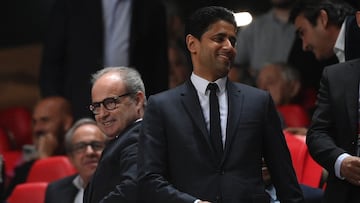 Paris saint-Germain's president Nasser Al-Khelaifi (R) attends the UEFA Champions League 1st round day 3 group H football match between SL Benfica and Paris Saint-Germain, at the Luz stadium in Lisbon on October 5, 2022. (Photo by FRANCK FIFE / AFP)