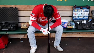 OAKLAND, CALIFORNIA - SEPTEMBER 01: Shohei Ohtani #17 of the Los Angeles Angels rests his head on his bat in the dugout before their game against the Oakland Athletics at RingCentral Coliseum on September 01, 2023 in Oakland, California.   Ezra Shaw/Getty Images/AFP (Photo by EZRA SHAW / GETTY IMAGES NORTH AMERICA / Getty Images via AFP)