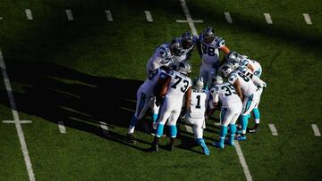 EAST RUTHERFORD, NJ - DECEMBER 20: Cam Newton #1 of the Carolina Panthers stands in the huddle against the New York Giants during their game at MetLife Stadium on December 20, 2015 in East Rutherford, New Jersey.   Al Bello/Getty Images/AFP
 == FOR NEWSPAPERS, INTERNET, TELCOS &amp; TELEVISION USE ONLY ==