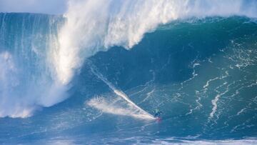 NAZARE, PORTUGAL - DECEMBER 12: Pierre Rollet of France surfs during Heat 1 of Round 1 of the TUDOR Nazaré Tow Surfing Challenge presented by Jogos Santa Casa on December 12, 2021 in Nazare, Portugal. (Photo by Laurent Masurel/World Surf L