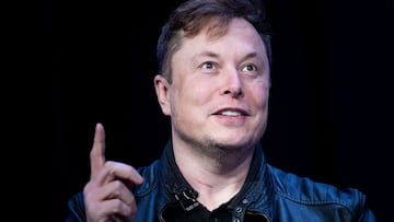 (FILES) In this file photo Elon Musk, founder of SpaceX, speaks during the Satellite 2020 at the Washington Convention Center on March 9, 2020, in Washington, DC. - Tesla began officially accepting bitcoin as currency to purchase electric autos, Chief Executive Elon Musk said on March 24, 2021 a with bitcoin," Musk said on Twitter, implementing a plan announced in February to accept the cryptocurrency as a form of payment. (Photo by Brendan Smialowski / AFP)