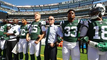 EAST RUTHERFORD, NJ - SEPTEMBER 24: Jermaine Kearse #10 and Josh McCown #15, Jamal Adams #33 and Christopher Johnson CEO of the New York Jets stand in unison with their team during the National Anthem prior to an NFL game against the Miami Dolphins at MetLife Stadium on September 24, 2017 in East Rutherford, New Jersey. (Photo by Al Bello/Getty Images)