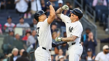 May 7, 2024; Bronx, New York, USA;  New York Yankees left fielder Alex Verdugo (24) celebrates with designated hitter Giancarlo Stanton (27) after hitting a three run home run in the first inning against the Houston Astros at Yankee Stadium. Mandatory Credit: Wendell Cruz-USA TODAY Sports