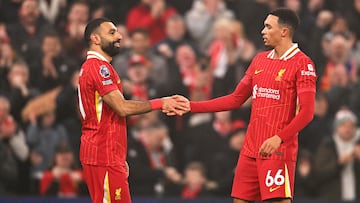 LIVERPOOL, ENGLAND - DECEMBER 26: (THE SUN OUT, THE SUN ON SUNDAY OUT) Mohamed Salah of Liverpool celebrates scoring his team's third goal with teammate Trent Alexander-Arnold during the Premier League match between Liverpool FC and Leicester City FC at Anfield on December 26, 2024 in Liverpool, England. (Photo by Liverpool FC/Liverpool FC via Getty Images)