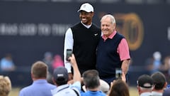Winner of The Open in 2000, 2005 and 2006, US golfer Tiger Woods (L) and Winner of The Open in 1966, 1970 and 1978, US former golfer Jack Nicklaus (R) pose for a photograph on the Swilcan Bridge, on the 18th hole during The R&A Celebration of Champions, part of the build-up towards The 150th British Open Golf Championship on The Old Course at St Andrews in Scotland, on July 11, 2022. - The Open's Champion Golfers, women's Major Champions, male and female amateur Champions, and golfers with disability Champions compete in a four-hole challenge over the 1st, 2nd, 17th, and 18th holes of the Old Course. (Photo by Glyn KIRK / AFP) / RESTRICTED TO EDITORIAL USE