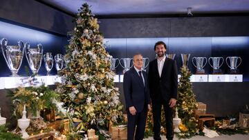 MADRID, SPAIN - DECEMBER 23: Florentino Pérez, president of Real Madrid and Sergio Llull, player of Real Madrid seen at the Real Madrid Christmas Photocall at Estadio Santiago Bernabeu on December 23, 2022 in Madrid, Spain. (Photo by Helios de la Rubia/Real Madrid via Getty Images)