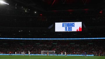 LONDON, ENGLAND - OCTOBER 07: A general view of match action with the scoreboard announcing the attendance at Wembley Stadium of 76,893 fans during the Women's International Friendly match between England and USA at Wembley Stadium on October 7, 2022 in London, England. (Photo by Matthew Ashton - AMA/Getty Images)