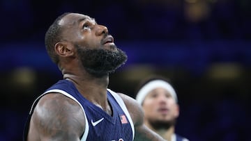 USA's #06 LeBron James reacts in the men's preliminary round group C basketball match between Serbia and USA during the Paris 2024 Olympic Games at the Pierre-Mauroy stadium in Villeneuve-d'Ascq, northern France, on July 28, 2024. (Photo by Thomas COEX / AFP)