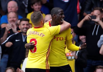 Doucouré celebrates with Tom Cleverley.