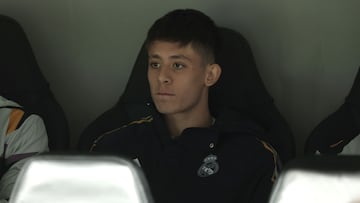 Real Madrid's Turkish midfielder #24 Arda Guler watches from the bench the UEFA Champions League group C football match between Real Madrid CF and SC Braga at the Santiago Bernabeu stadium in Madrid on November 8, 2023. (Photo by Thomas COEX / AFP)