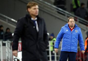 Overseeing his men during a friendly against Lithuania