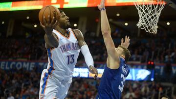 Nov 10, 2017; Oklahoma City, OK, USA; Oklahoma City Thunder forward Paul George (13) shoots the ball defended by LA Clippers forward Blake Griffin (32) during the fourth quarter at Chesapeake Energy Arena. Mandatory Credit: Mark D. Smith-USA TODAY Sports