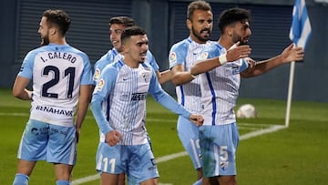 Juande, del Málaga, celebra uno de sus tantos junto a varios compañeros.