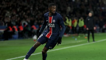 Paris Saint-Germain's French forward #10 Ousmane Dembele runs with the ball during the French L1 football match between Paris Saint-Germain (PSG) and Stade de Reims at the Parc des Princes Stadium in Paris on January 25, 2025. (Photo by Thomas SAMSON / AFP)