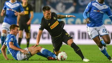 (FILES) In this file photo taken on October 29, 2019 Inter Milan&#039;s Argentinian forward Lautaro Martinez (C) challenges Brescia&#039;s Italian defender Daniele Gastaldello (L) and Brescia&#039;s Italian forward Mario Balotelli (R) during the Italian S