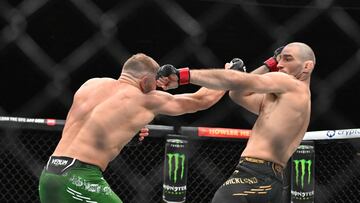 Jan 20, 2024; Toronto, Canada, USA; Sean Strickland (red glove) fights Dricus Du Plessis (blue gloves) during UFC 297 at ScotiaBank Arena. Mandatory Credit: Dan Hamilton-USA TODAY Sports