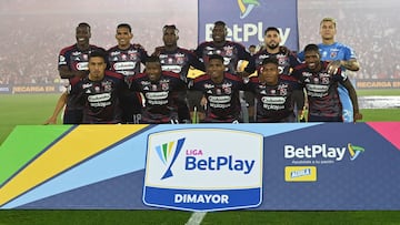 Medellin players pose for a team photo before the first leg of the Colombian football championship final between Independiente Santa Fe and Independiente Medellin at the Nemesio Camacho El Campin Stadium in Bogota on June 24, 2025. (Photo by Luis ACOSTA / AFP)