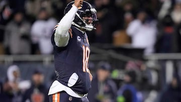 CHICAGO, ILLINOIS - JANUARY 10: Caleb Williams #18 of the Chicago Bears celebrates a touchdown by D'Andre Swift #4 (not pictured) against the Green Bay Packers during the fourth quarter in the NFC Wild Card Playoff game at Soldier Field on January 10, 2026 in Chicago, Illinois. Patrick McDermott/Getty Images/AFP (Photo by Patrick McDermott / GETTY IMAGES NORTH AMERICA / Getty Images via AFP)