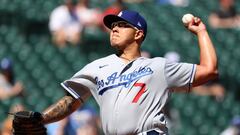 SEATTLE, WASHINGTON - APRIL 20: Julio Urias #7 of the Los Angeles Dodgers pitches during the first inning against the Seattle Mariners at T-Mobile Park on April 20, 2021 in Seattle, Washington. Abbie Parr/Getty Images/AFP  == FOR NEWSPAPERS, INTERNET, TELCOS & TELEVISION USE ONLY ==