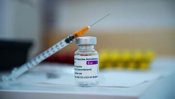 This photograph shows a syringe poses on a vial of AstraZeneca anti-covid-19 vaccine in a pharmacy in Paris on March 12, 2021, as pharmacies have been authorised to give Covid-19 vaccinations - for the first time in the vaccination campaign in France. (Ph