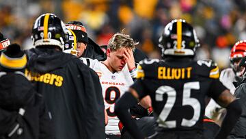 PITTSBURGH, PENNSYLVANIA - JANUARY 04: Joe Burrow #9 of the Cincinnati Bengals reacts after being injured on a play in the third quarter of a game against the Pittsburgh Steelers at Acrisure Stadium on January 04, 2025 in Pittsburgh, Pennsylvania. Joe Sargent/Getty Images/AFP (Photo by Joe Sargent / GETTY IMAGES NORTH AMERICA / Getty Images via AFP)