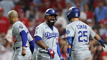 PHILADELPHIA, PENNSYLVANIA - OCTOBER 04: Teoscar Hernandez #37 of the Los Angeles Dodgers celebrates his three-run home run with teammate Tommy Edman #25 in the seventh inning against the Philadelphia Phillies in game one of the Division Series at Citizens Bank Park on October 04, 2025 in Philadelphia, Pennsylvania. Emilee Chinn/Getty Images/AFP (Photo by Emilee Chinn / GETTY IMAGES NORTH AMERICA / Getty Images via AFP)