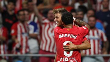 Soccer Football - Spain - LaLiga - Atletico Madrid v Granada - Metropolitano, Madrid, Spain - August 14, 2023 Atletico Madrid's Marcos Llorente celebrates scoring their third goal with Memphis Depay REUTERS/Violeta Santos Moura